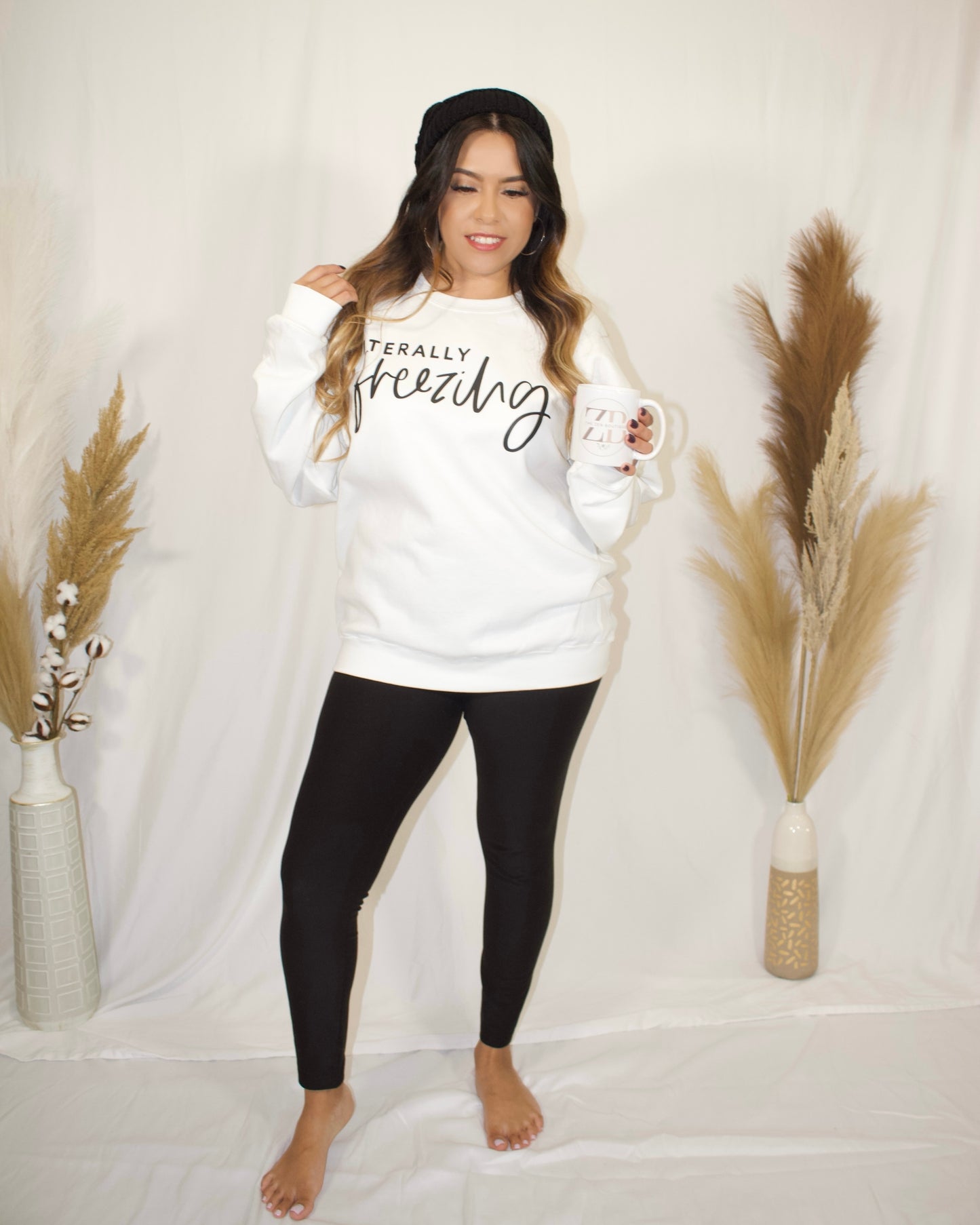 full body, front side, of white sweater with wording literally freezing