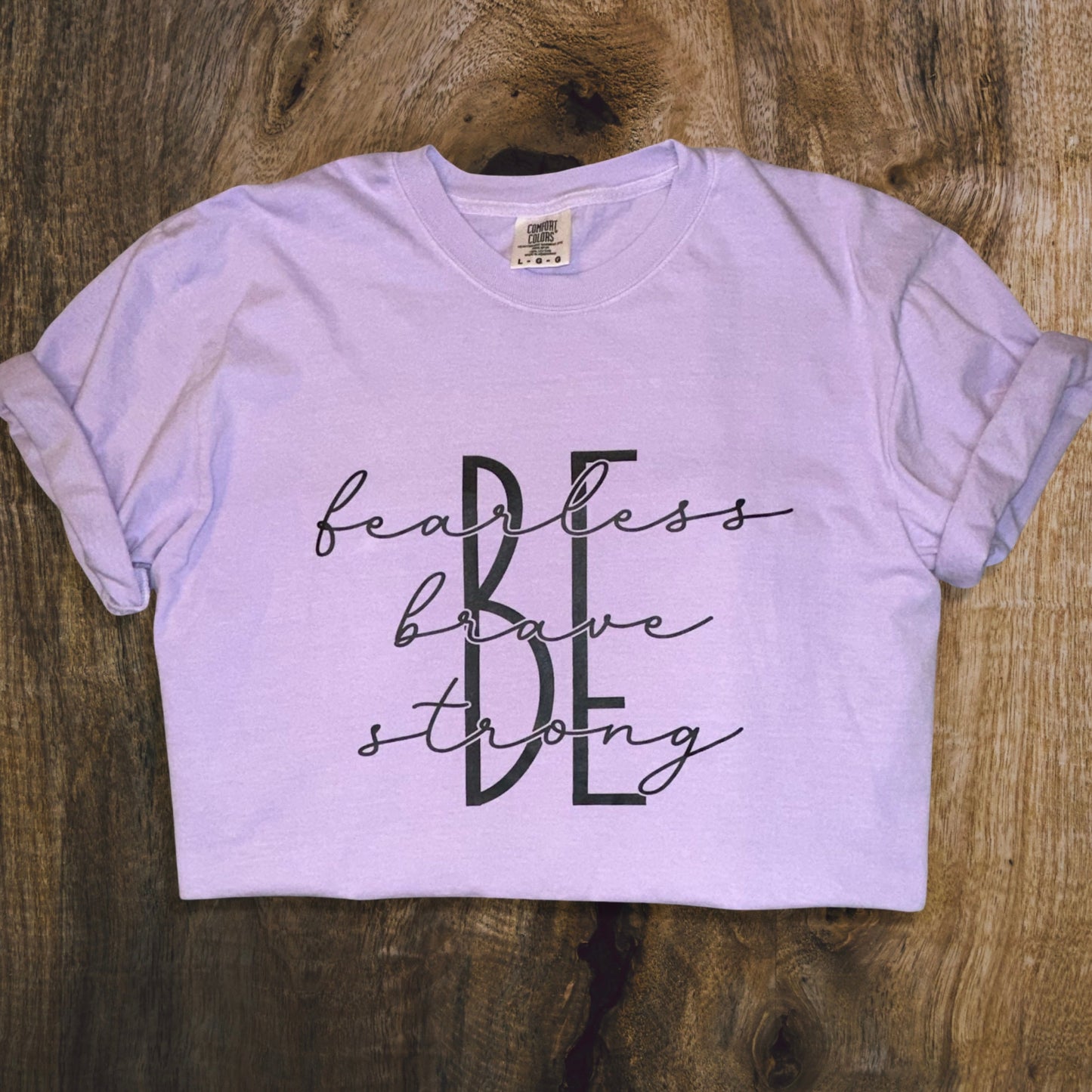 T-shirt, with wording be fearless, brave, strong front side, close up color lilac
