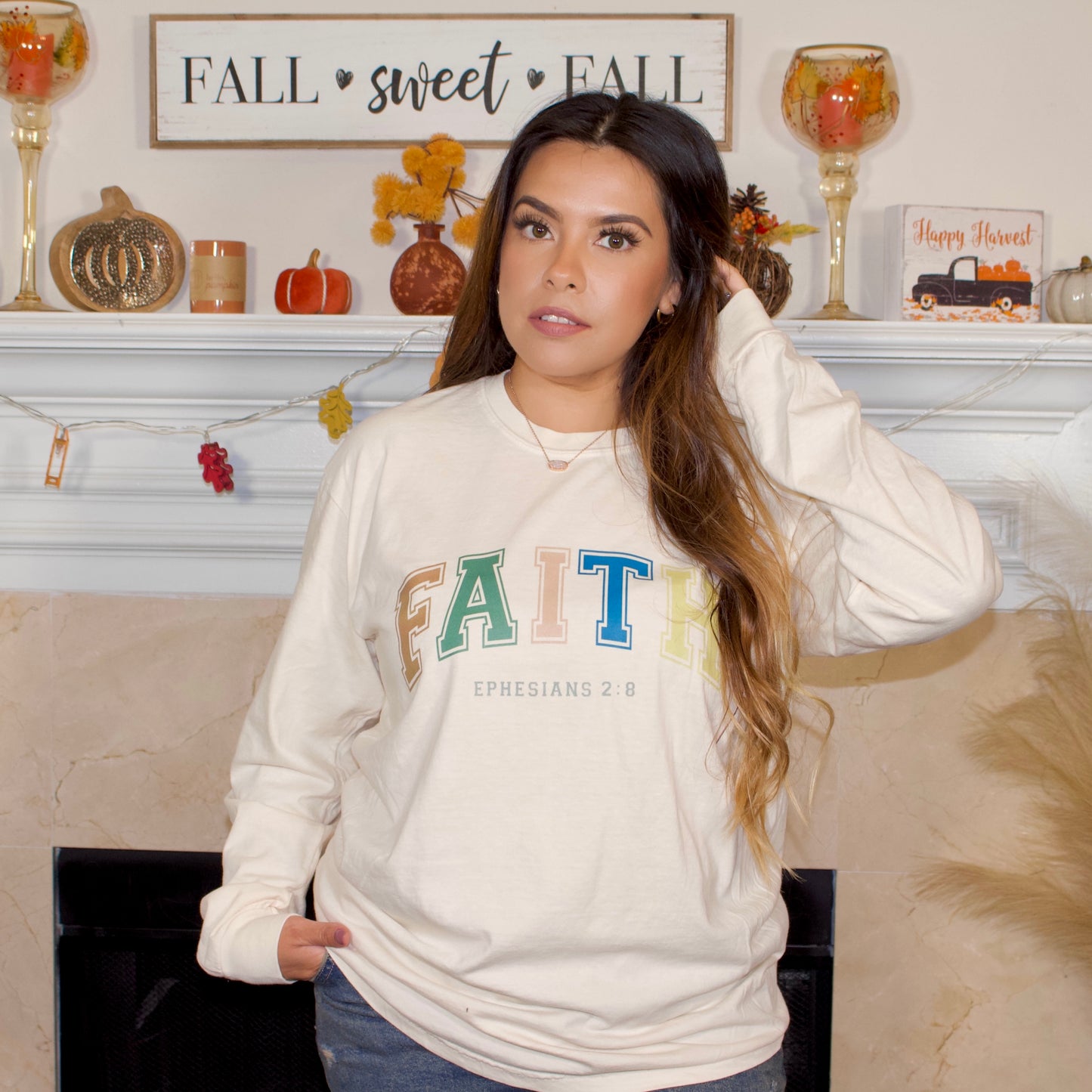 multi fall color letter print on a ivory long sleeve t-shirt with faith on it