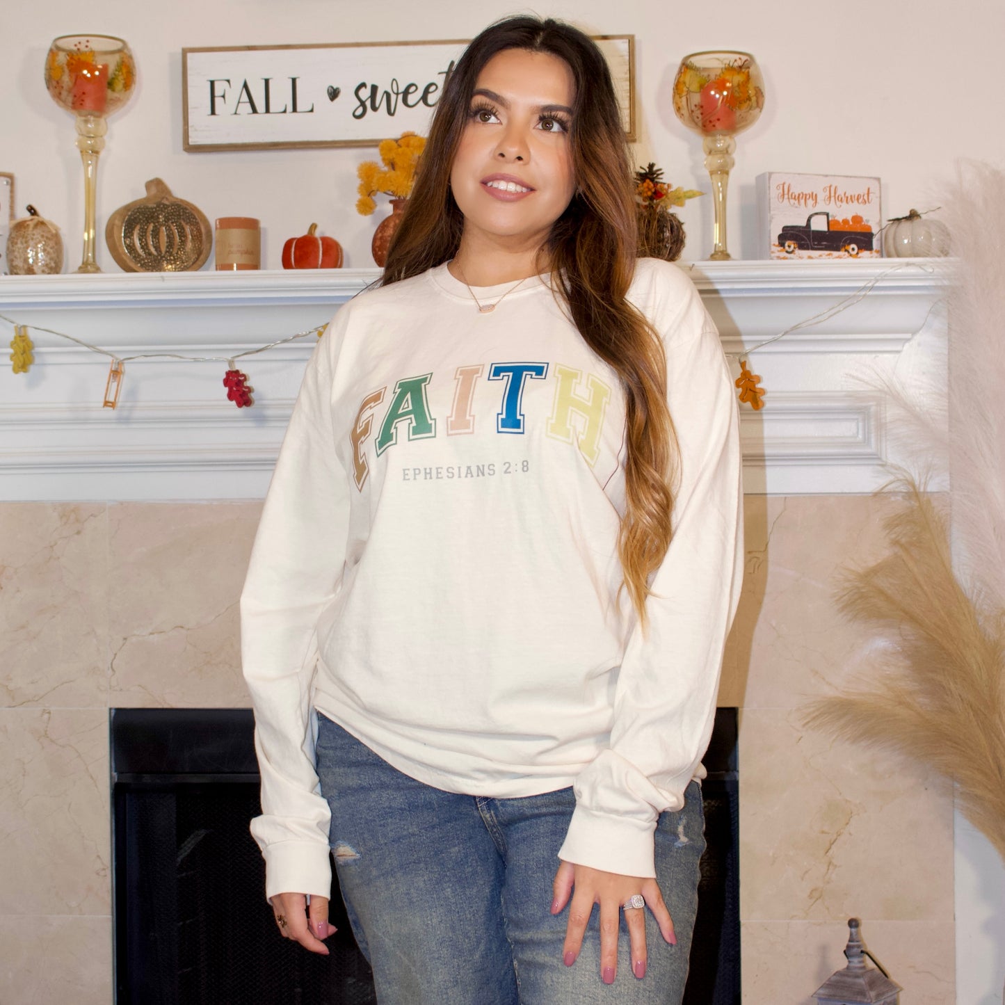 multi fall color letter print on a ivory long sleeve t-shirt with faith on it