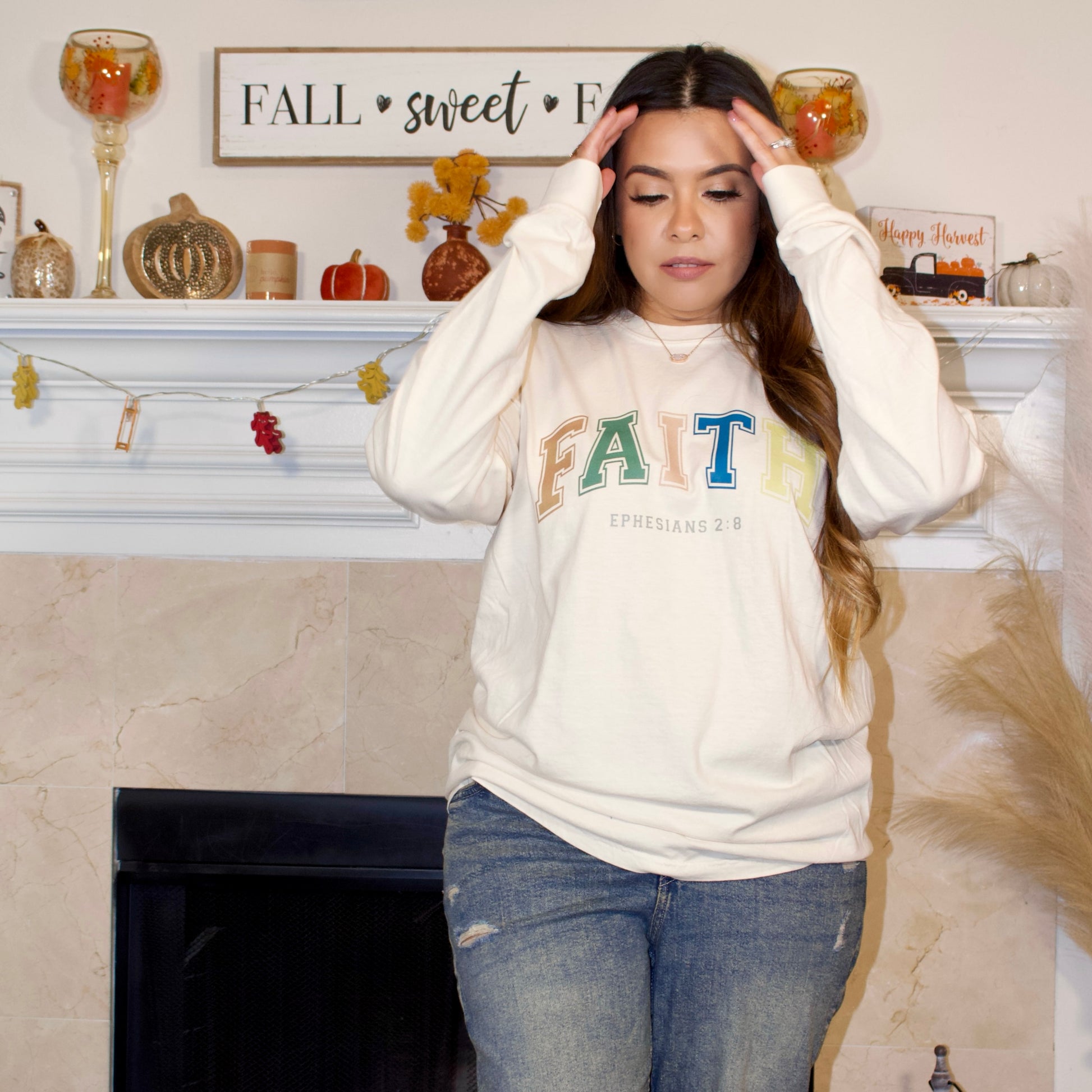 multi fall color letter print on a ivory long sleeve t-shirt with faith on it