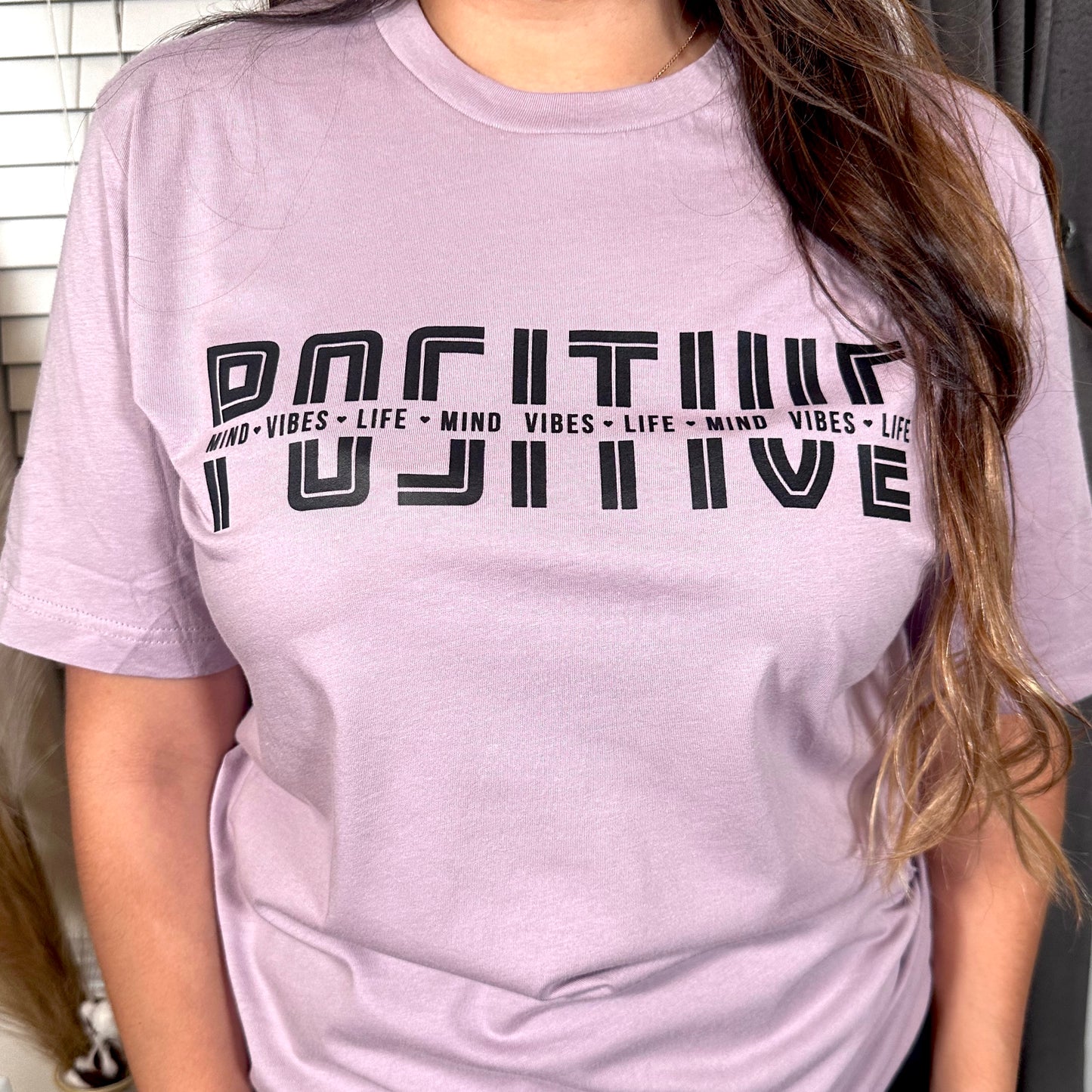 black letters, positive mind, vibes,life on a light violet purple t shirt