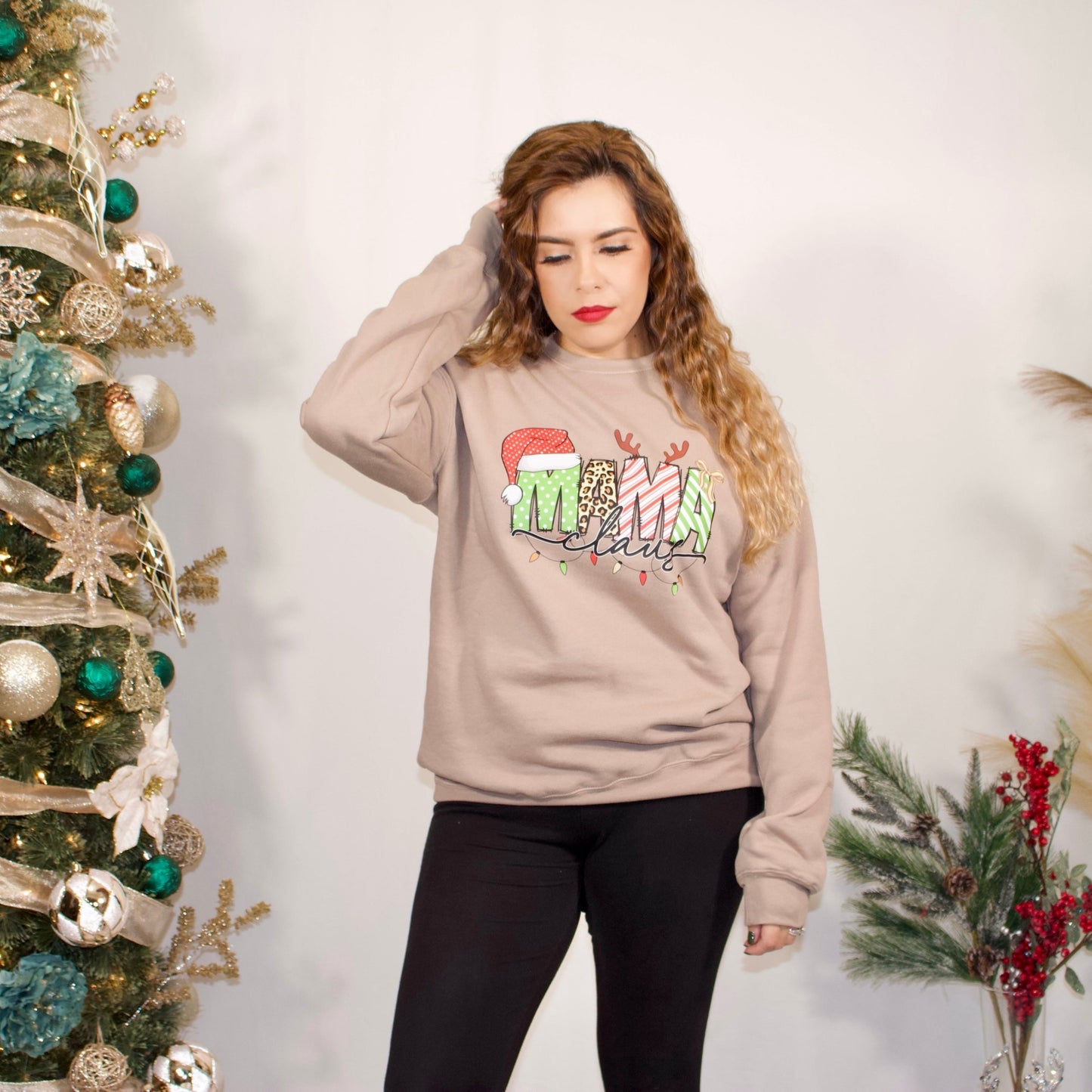 TAN SWEATSHIRT WITH MAMA CLAUS FRONT SIDE WITH COLORFUL LETTERS