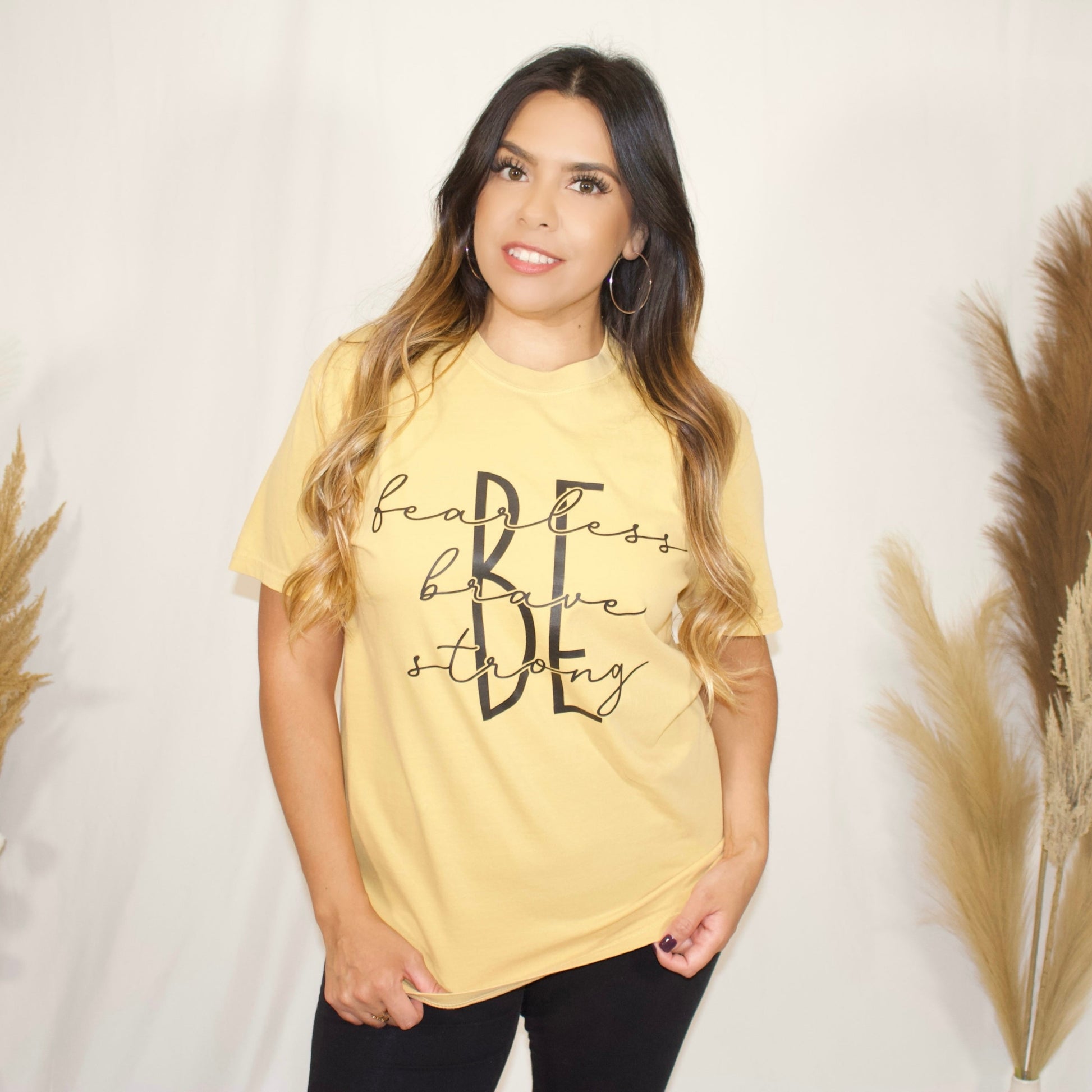 Mustard t-shirt, with wording be fearless, brave, strong front side