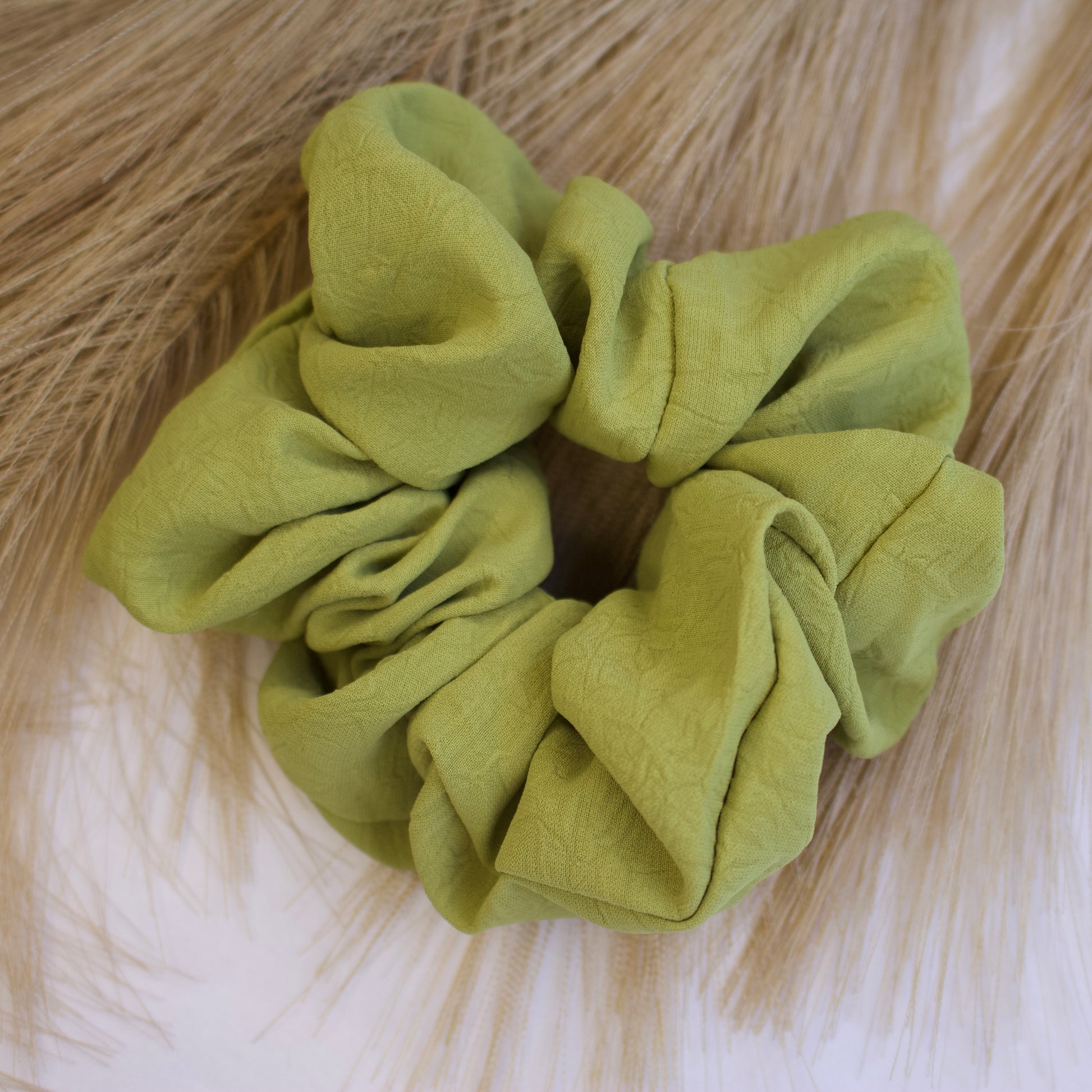 close up green scrunchie